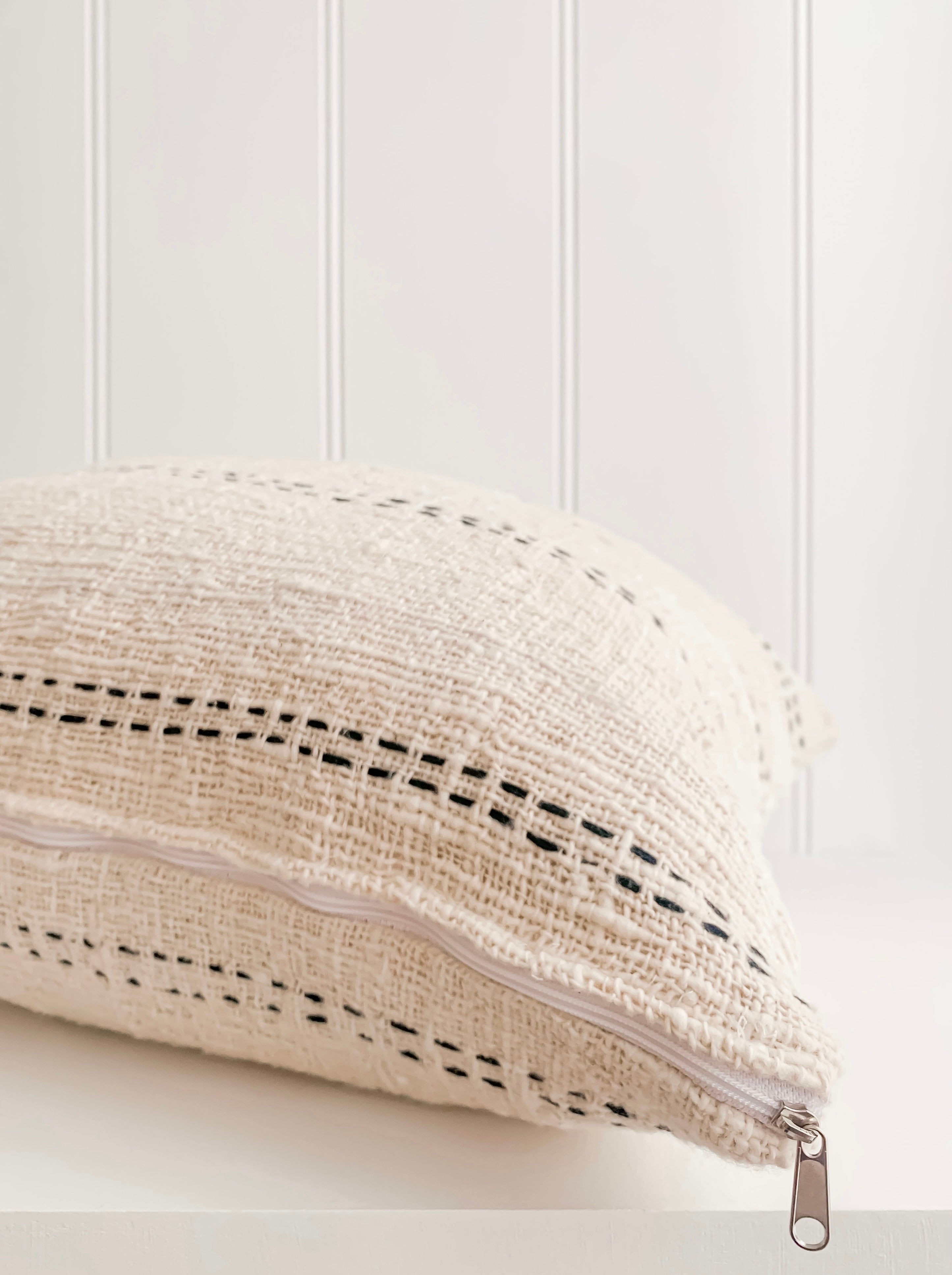 A Nyah | Stitch Cushion pillow.